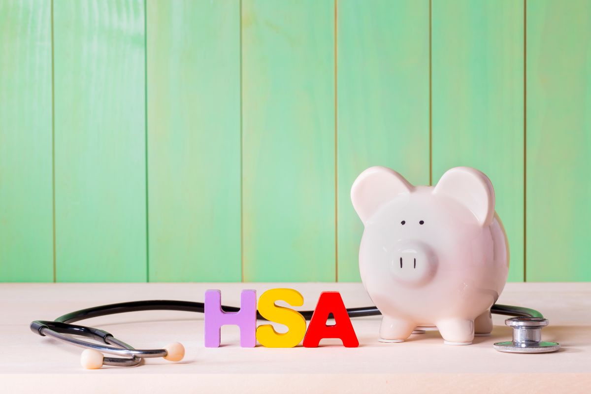 Piggy bank with HSA letters next to it