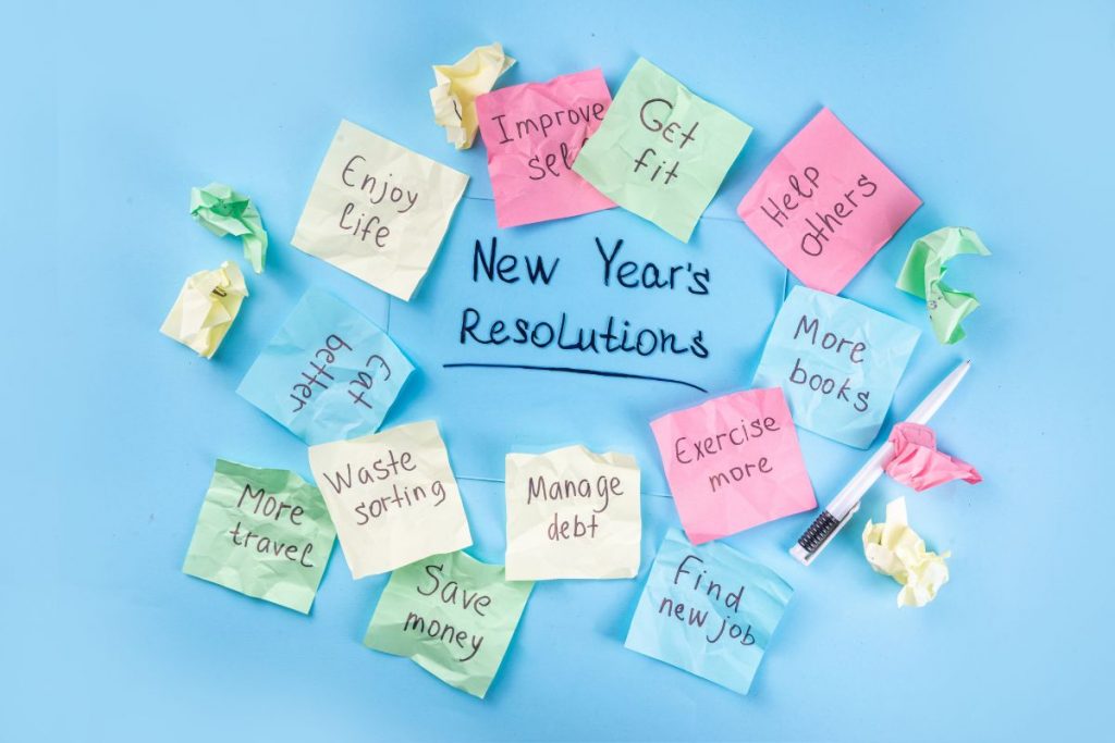 New Years Resolutions on post-it notes, including save money on Medicare