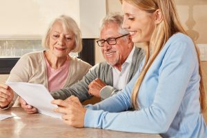 Medicare advisor reviewing the ANOC with her clients