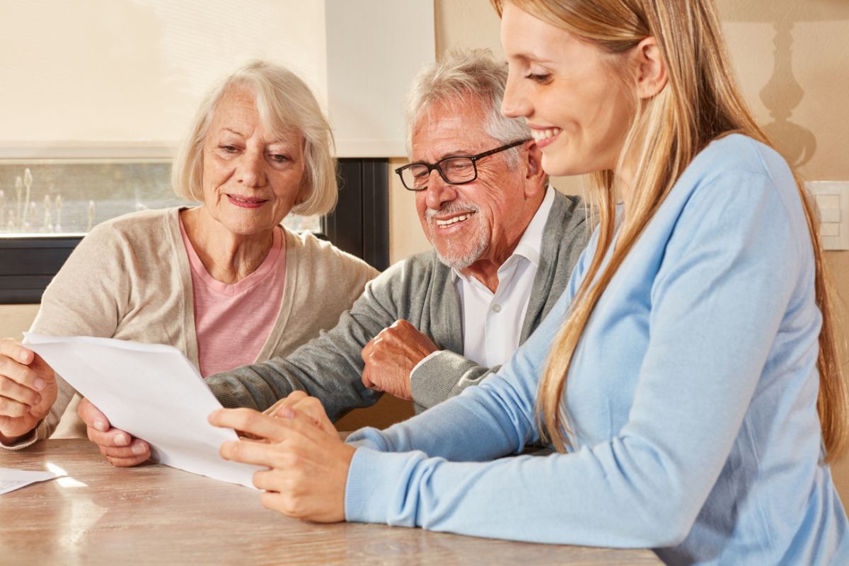 Medicare advisor reviewing the ANOC with her clients