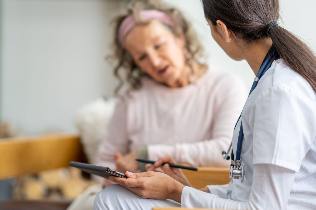 Medicare advisor explaining Medicaid to a beneficiary