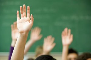 Raised hand with questions about Medicare AEP versus OEP
