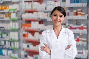 Pharmacist helping with new Medicare Part D plans