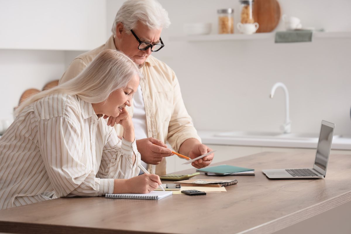 Couple calculating their Medicare IRMAA in 2026