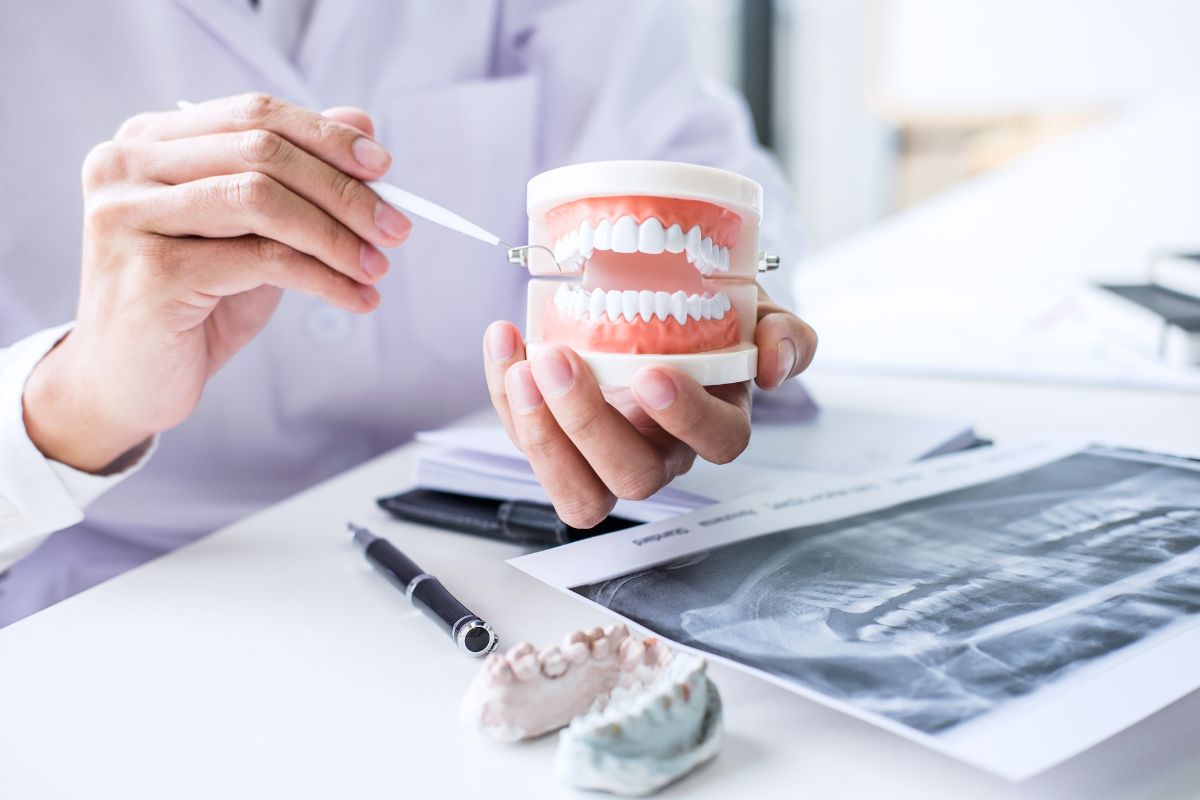 Dentist reviewing good oral care routines