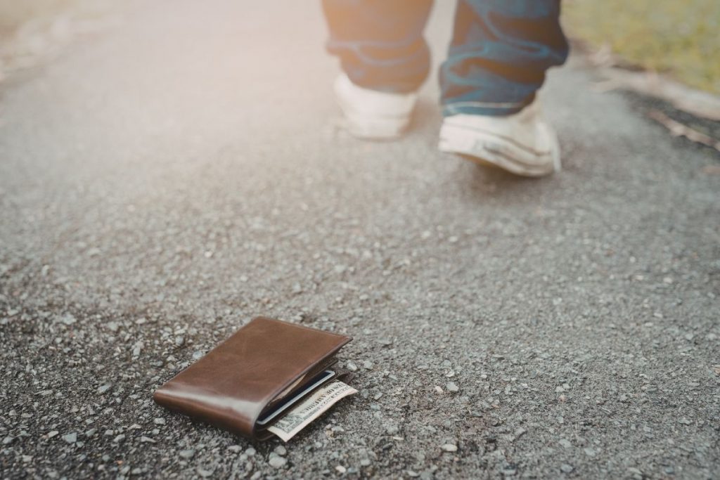 Walking away from a wallet with a lost Medicare card inside