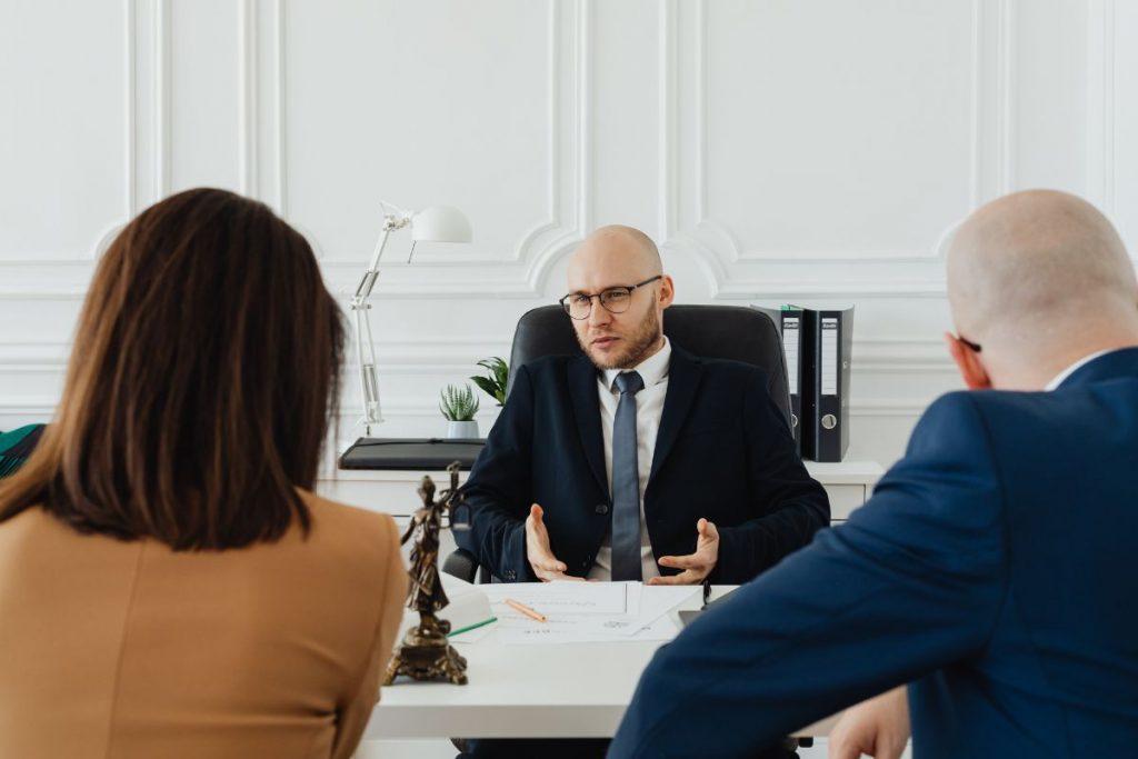 A Medicare advisor with his clients